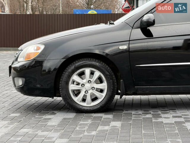 Черный Киа Черато, объемом двигателя 1.98 л и пробегом 180 тыс. км за 5500 $, фото 6 на Automoto.ua
