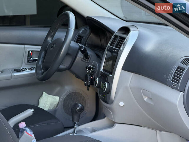 Черный Киа Черато, объемом двигателя 1.98 л и пробегом 180 тыс. км за 5750 $, фото 42 на Automoto.ua