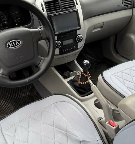 Черный Киа Черато, объемом двигателя 2 л и пробегом 186 тыс. км за 4999 $, фото 3 на Automoto.ua