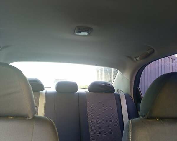 Чорний Кіа Черато, об'ємом двигуна 1.6 л та пробігом 232 тис. км за 4250 $, фото 18 на Automoto.ua