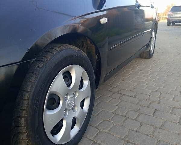 Чорний Кіа Черато, об'ємом двигуна 1.6 л та пробігом 232 тис. км за 4250 $, фото 8 на Automoto.ua