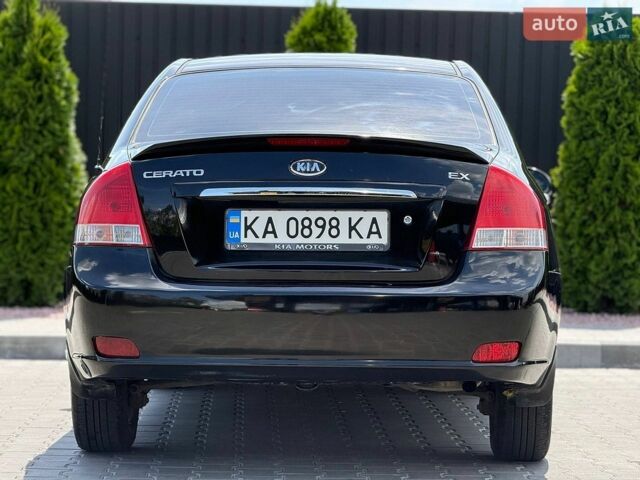 Чорний Кіа Черато, об'ємом двигуна 2 л та пробігом 242 тис. км за 4999 $, фото 3 на Automoto.ua
