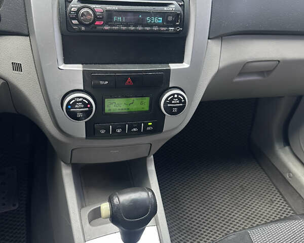 Черный Киа Черато, объемом двигателя 2 л и пробегом 220 тыс. км за 3400 $, фото 7 на Automoto.ua