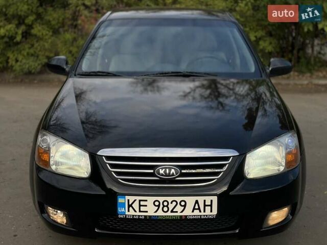 Черный Киа Черато, объемом двигателя 2 л и пробегом 173 тыс. км за 4800 $, фото 1 на Automoto.ua