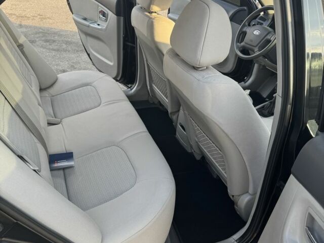 Черный Киа Черато, объемом двигателя 1.6 л и пробегом 156 тыс. км за 5500 $, фото 14 на Automoto.ua