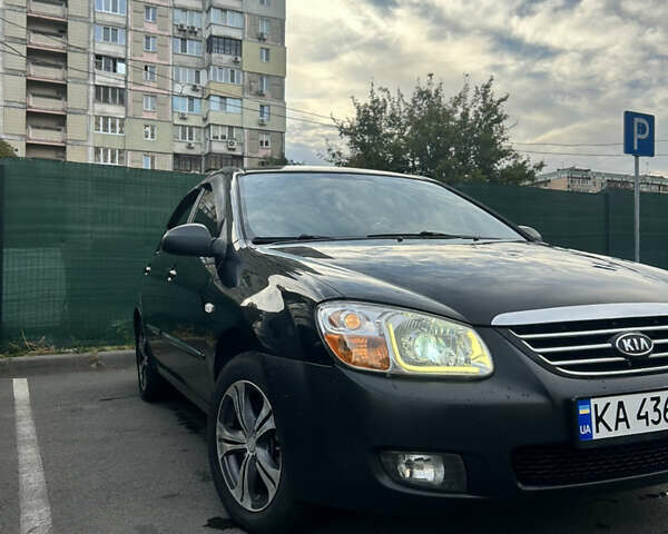 Черный Киа Черато, объемом двигателя 1.58 л и пробегом 350 тыс. км за 4500 $, фото 1 на Automoto.ua