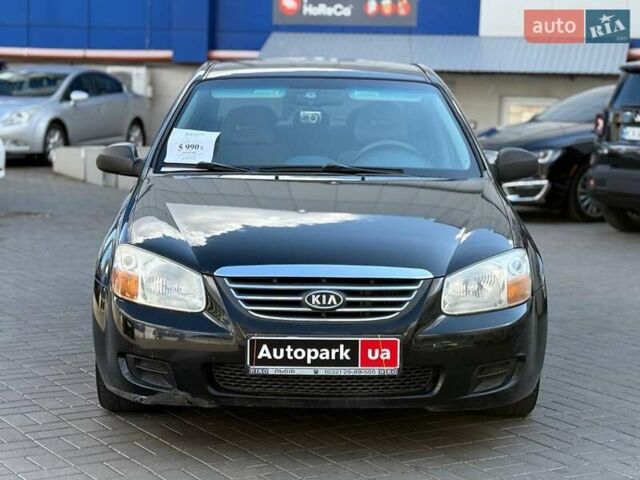 Чорний Кіа Черато, об'ємом двигуна 1.6 л та пробігом 239 тис. км за 5390 $, фото 1 на Automoto.ua