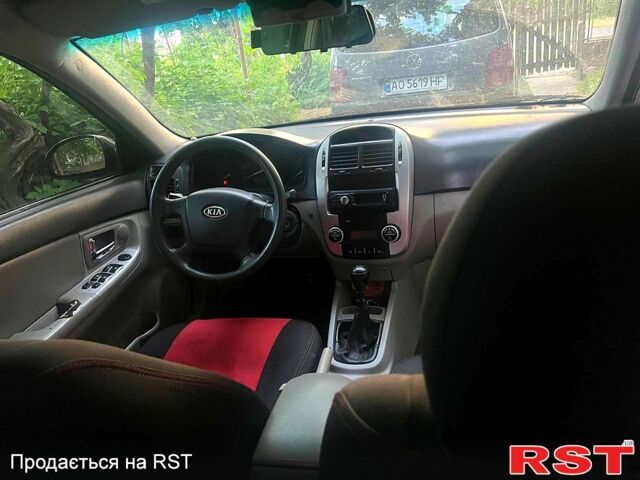 Чорний Кіа Черато, об'ємом двигуна 1.6 л та пробігом 330 тис. км за 2700 $, фото 4 на Automoto.ua