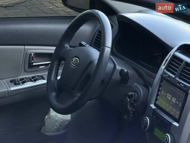 Черный Киа Черато, объемом двигателя 1.98 л и пробегом 180 тыс. км за 5750 $, фото 34 на Automoto.ua