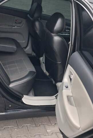 Кіа Черато 2008 у Кременчуге на Automoto.ua Чорний Кіа Черато, об'ємом двигуна 2 л та пробігом 193 тис. км за 5300 $, фото 11 на Automoto.ua