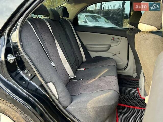 Чорний Кіа Черато, об'ємом двигуна 1.59 л та пробігом 75 тис. км за 6690 $, фото 10 на Automoto.ua