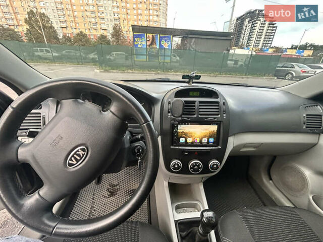 Черный Киа Черато, объемом двигателя 1.58 л и пробегом 350 тыс. км за 4500 $, фото 13 на Automoto.ua