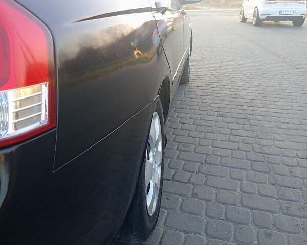 Чорний Кіа Черато, об'ємом двигуна 1.6 л та пробігом 232 тис. км за 4250 $, фото 5 на Automoto.ua