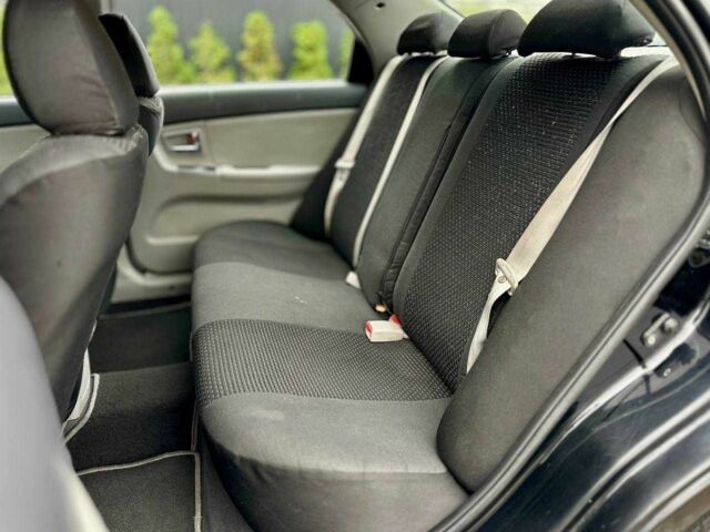 Чорний Кіа Черато, об'ємом двигуна 2 л та пробігом 270 тис. км за 4000 $, фото 9 на Automoto.ua