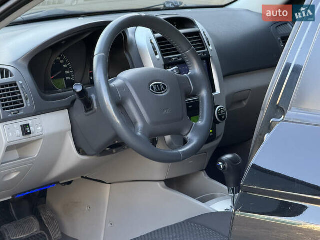 Черный Киа Черато, объемом двигателя 1.98 л и пробегом 180 тыс. км за 5750 $, фото 36 на Automoto.ua