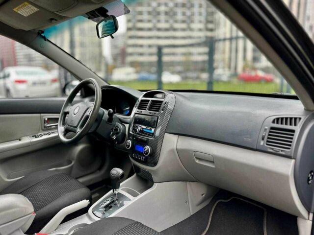 Чорний Кіа Черато, об'ємом двигуна 2 л та пробігом 270 тис. км за 4000 $, фото 13 на Automoto.ua