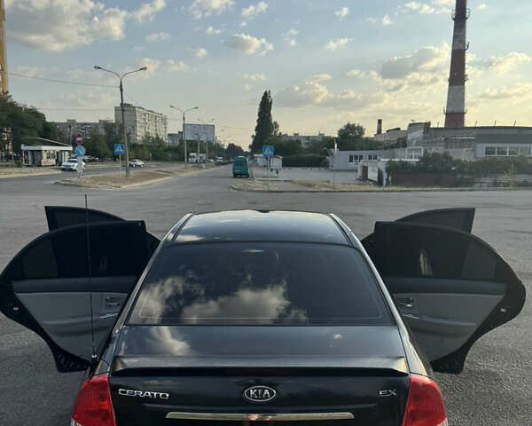 Чорний Кіа Черато, об'ємом двигуна 1.6 л та пробігом 156 тис. км за 4900 $, фото 11 на Automoto.ua