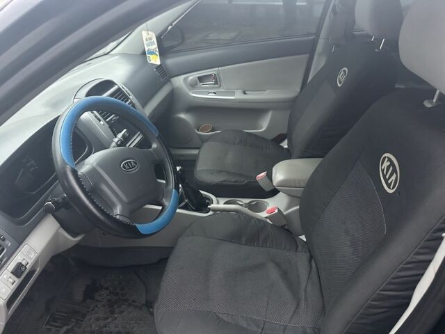 Черный Киа Черато, объемом двигателя 2 л и пробегом 262 тыс. км за 4800 $, фото 3 на Automoto.ua