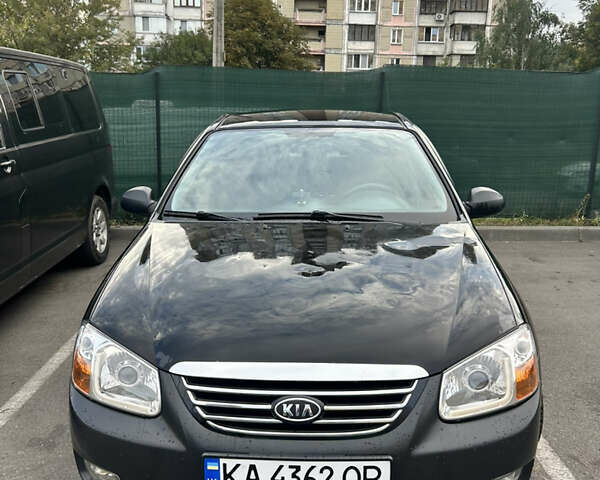 Черный Киа Черато, объемом двигателя 1.58 л и пробегом 350 тыс. км за 4500 $, фото 7 на Automoto.ua