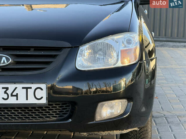 Черный Киа Черато, объемом двигателя 1.98 л и пробегом 180 тыс. км за 5750 $, фото 3 на Automoto.ua