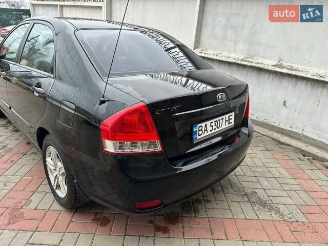 Чорний Кіа Черато, об'ємом двигуна 1.59 л та пробігом 192 тис. км за 4500 $, фото 4 на Automoto.ua