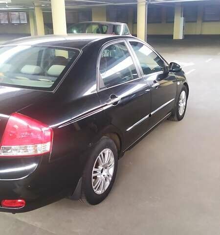 Черный Киа Черато, объемом двигателя 1.6 л и пробегом 188 тыс. км за 5200 $, фото 2 на Automoto.ua