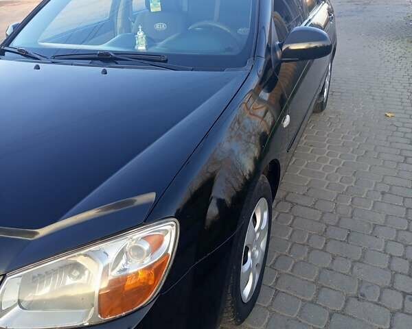 Чорний Кіа Черато, об'ємом двигуна 1.6 л та пробігом 232 тис. км за 4250 $, фото 7 на Automoto.ua