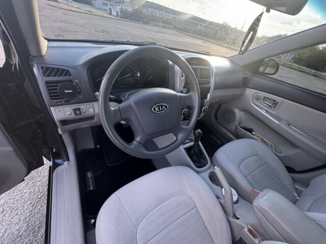 Черный Киа Черато, объемом двигателя 1.6 л и пробегом 156 тыс. км за 5500 $, фото 17 на Automoto.ua