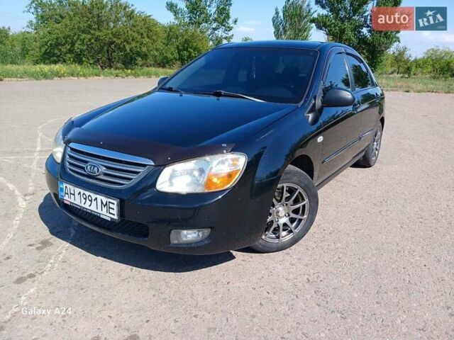 Черный Киа Черато, объемом двигателя 1.6 л и пробегом 225 тыс. км за 5200 $, фото 4 на Automoto.ua