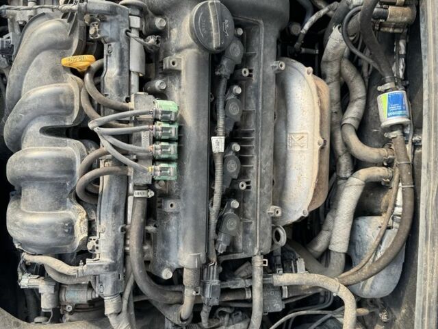 Черный Киа Черато, объемом двигателя 1.6 л и пробегом 156 тыс. км за 5500 $, фото 13 на Automoto.ua