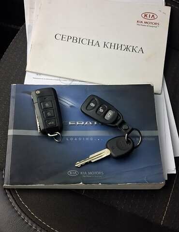 Кіа Черато 2008 у Кременчуге на Automoto.ua Чорний Кіа Черато, об'ємом двигуна 2 л та пробігом 193 тис. км за 5300 $, фото 20 на Automoto.ua