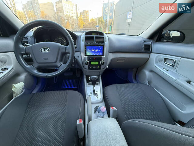 Черный Киа Черато, объемом двигателя 1.98 л и пробегом 180 тыс. км за 5750 $, фото 30 на Automoto.ua