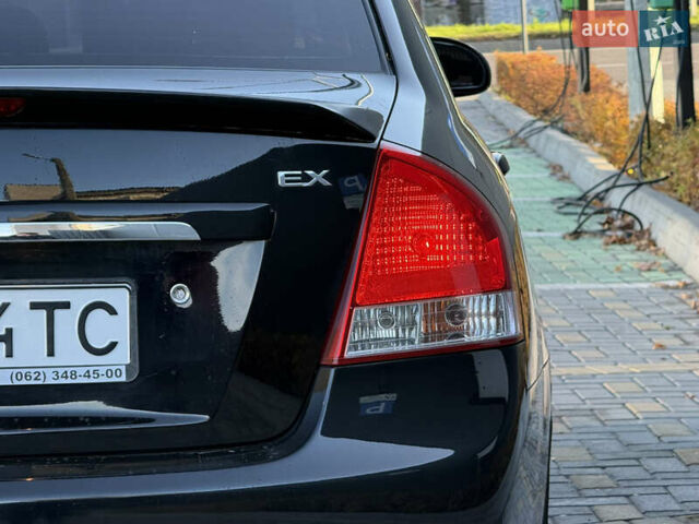 Черный Киа Черато, объемом двигателя 1.98 л и пробегом 180 тыс. км за 5750 $, фото 11 на Automoto.ua