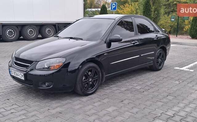 Кіа Черато 2008 у Кременчуге на Automoto.ua Чорний Кіа Черато, об'ємом двигуна 2 л та пробігом 193 тис. км за 5300 $, фото 7 на Automoto.ua