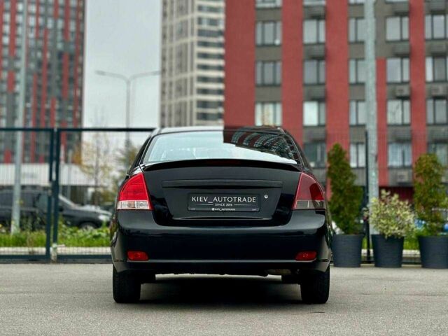 Чорний Кіа Черато, об'ємом двигуна 2 л та пробігом 270 тис. км за 4000 $, фото 3 на Automoto.ua