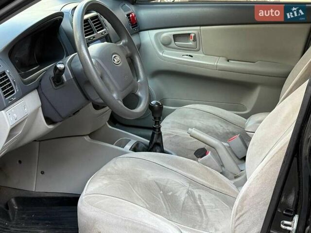 Чорний Кіа Черато, об'ємом двигуна 1.6 л та пробігом 239 тис. км за 5390 $, фото 6 на Automoto.ua