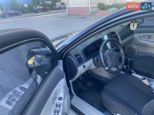 Черный Киа Черато, объемом двигателя 1.59 л и пробегом 166 тыс. км за 4600 $, фото 9 на Automoto.ua