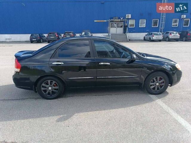 Черный Киа Черато, объемом двигателя 2 л и пробегом 298 тыс. км за 4250 $, фото 8 на Automoto.ua