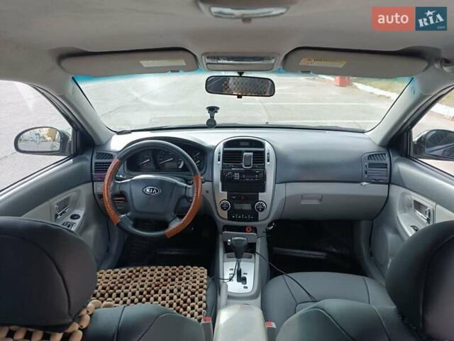 Черный Киа Черато, объемом двигателя 2 л и пробегом 298 тыс. км за 4250 $, фото 11 на Automoto.ua