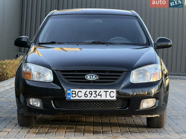 Черный Киа Черато, объемом двигателя 1.98 л и пробегом 180 тыс. км за 5750 $, фото 1 на Automoto.ua