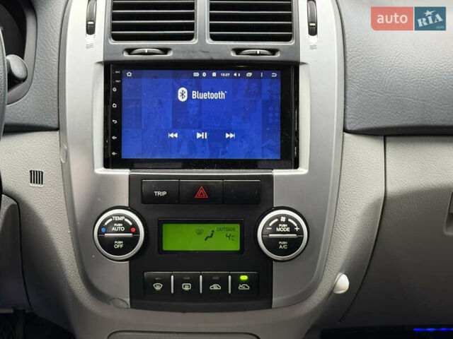 Черный Киа Черато, объемом двигателя 1.98 л и пробегом 180 тыс. км за 5500 $, фото 39 на Automoto.ua