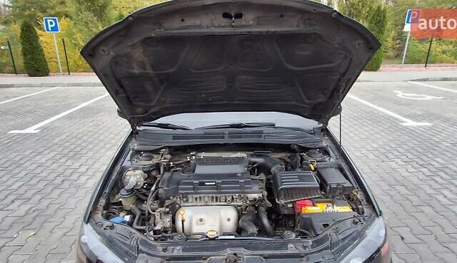 Кіа Черато 2008 у Кременчуге на Automoto.ua Чорний Кіа Черато, об'ємом двигуна 2 л та пробігом 193 тис. км за 5300 $, фото 13 на Automoto.ua