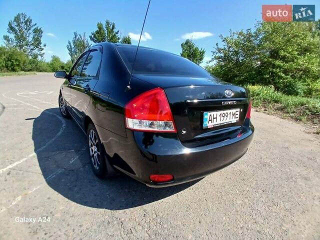 Черный Киа Черато, объемом двигателя 1.6 л и пробегом 225 тыс. км за 5200 $, фото 6 на Automoto.ua
