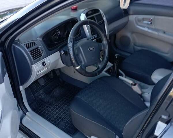 Черный Киа Черато, объемом двигателя 1.59 л и пробегом 166 тыс. км за 4600 $, фото 15 на Automoto.ua