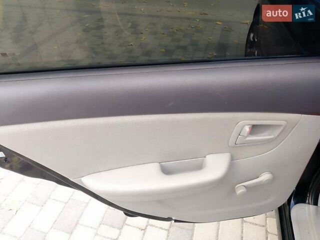 Чорний Кіа Черато, об'ємом двигуна 1.6 л та пробігом 335 тис. км за 5500 $, фото 12 на Automoto.ua