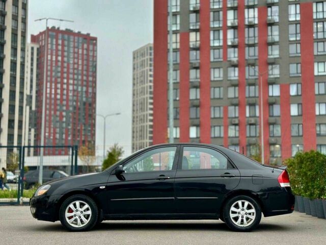 Чорний Кіа Черато, об'ємом двигуна 2 л та пробігом 270 тис. км за 4000 $, фото 7 на Automoto.ua