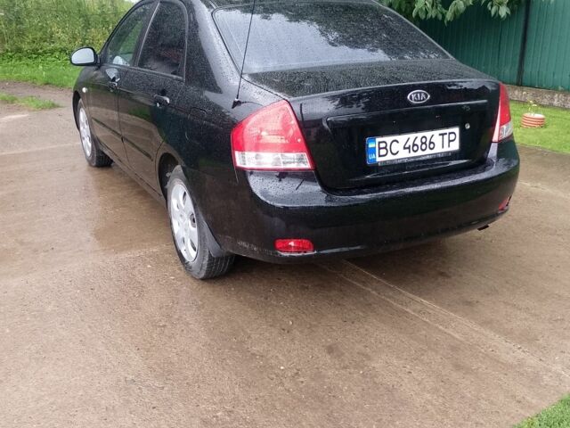 Черный Киа Черато, объемом двигателя 1.6 л и пробегом 208 тыс. км за 4700 $, фото 5 на Automoto.ua