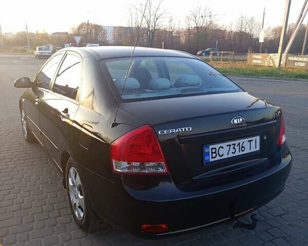 Чорний Кіа Черато, об'ємом двигуна 1.6 л та пробігом 232 тис. км за 4250 $, фото 2 на Automoto.ua