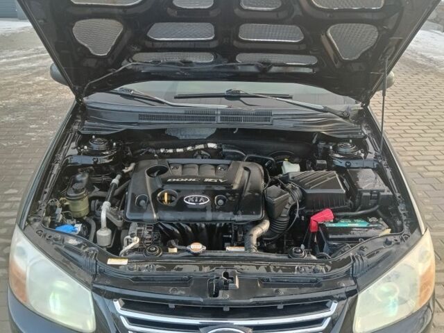 Чорний Кіа Черато, об'ємом двигуна 0 л та пробігом 220 тис. км за 4200 $, фото 6 на Automoto.ua