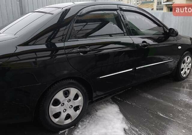 Черный Киа Черато, объемом двигателя 1.6 л и пробегом 192 тыс. км за 4250 $, фото 3 на Automoto.ua